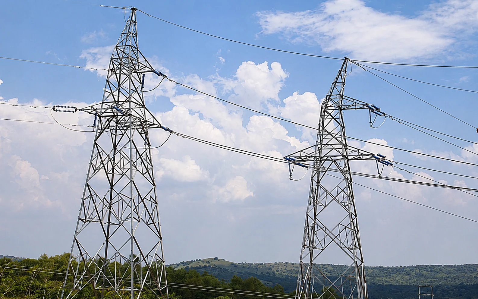 Lattice transmission towers on a mountain route